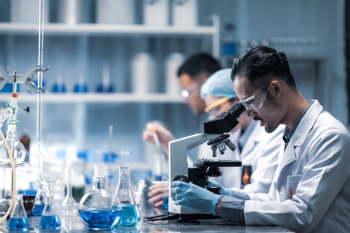 young-scientist-looking-through-microscope-laboratory-young-scientist-doing-some-research_laboratory